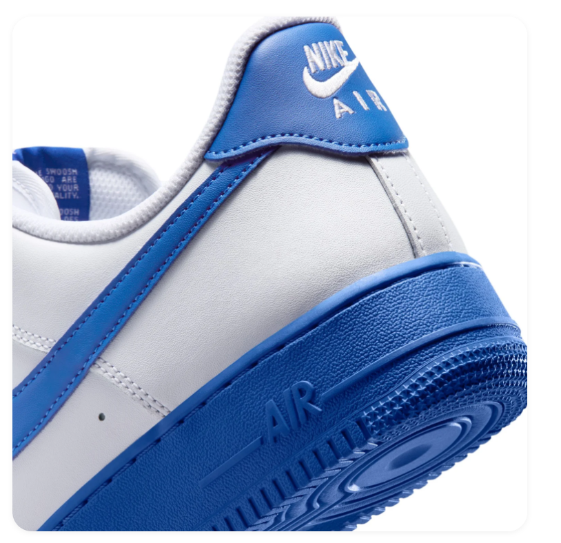 Nike Air Force 1 White Sneakers with Blue Swoosh and Sole