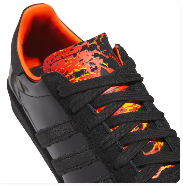 Adidas Black Glossy Low-Top Sneakers with Orange Lining